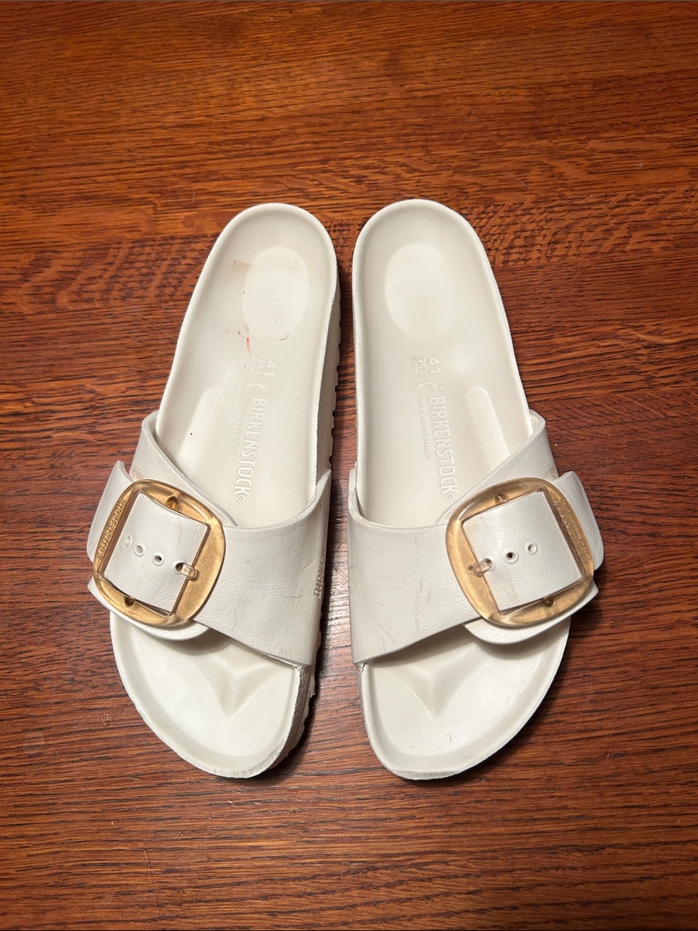 Birkenstock White Slide Sandals with Large Gold Buckles